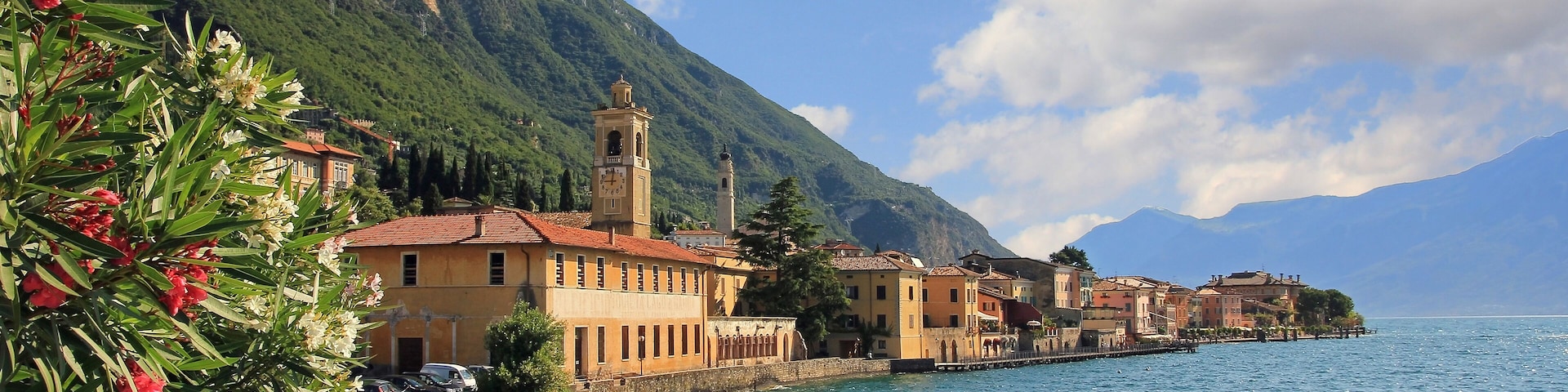 pictorial village gargnano, lago di garda, lakeside promenade with oleander and church; Shutterstock ID 278755586