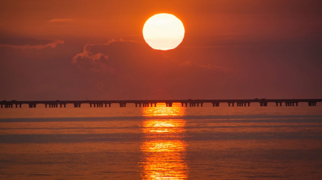 Lake Pontchartrain Causeway twin span bridges seen at sunset from Mandeville, Louisiana