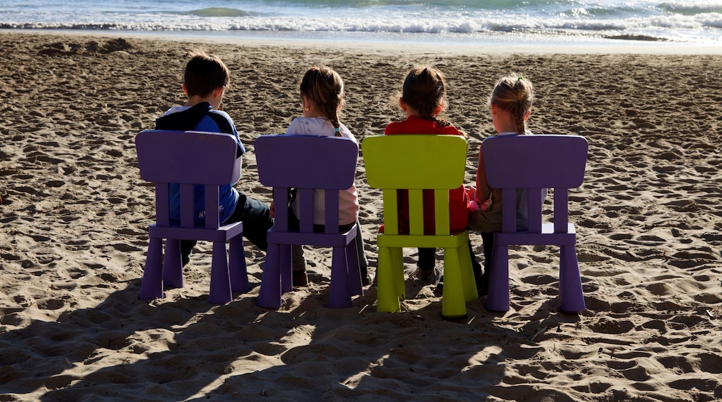Alassio (SV), Italy - February 15, 2017: Childrens playing in beach in Alassio, Riviera dei Fiori, Savona, Liguria, Italy.
