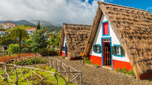 Traditional historic thatched houses with strawy roofs on Madeira island, Santana, Portugal