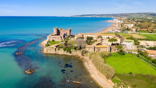 Aerial view of the Castle of Santa Severa, located in Santa Marinella in Lazio, in the Metropolitan City of Rome, Italy. It is a medieval castle built on the beach and overlooking the Tyrrhenian Sea.