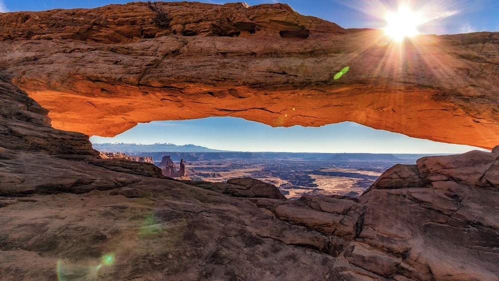 The Mesa Arch in Canyonlands National Park is one of the most photographed features of the Utah landscape. I loved the weird martian-like landscape in the canyon below the arch and then the snow-capped mountains in the distance.