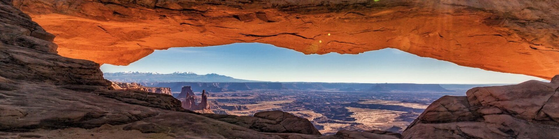 The Mesa Arch in Canyonlands National Park is one of the most photographed features of the Utah landscape. I loved the weird martian-like landscape in the canyon below the arch and then the snow-capped mountains in the distance.