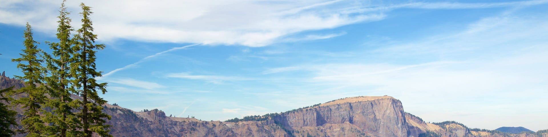 Crater Lake National Park showing mountains, landscape views and a lake or waterhole
