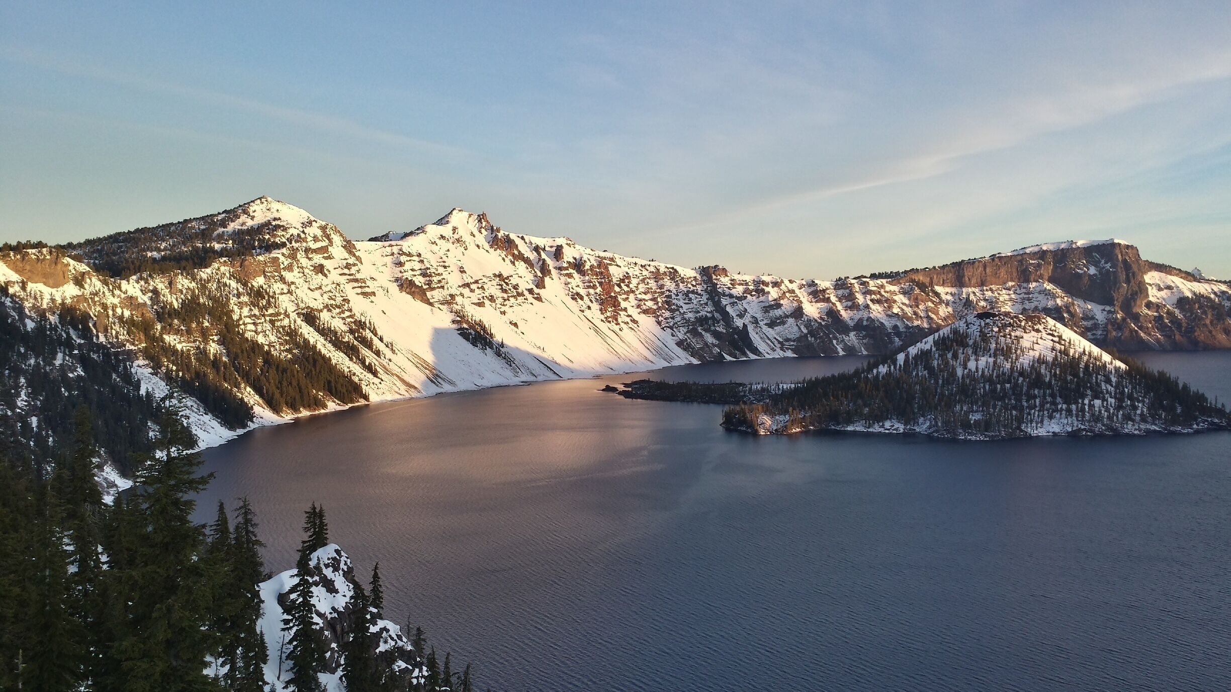Wake up early and enjoy the sun dancing in the rim of Crater Lake until Wizard Island is lit. Visit in winter for less crowds but make sure you pack snowshoes. #snow

Check out more from my Crater Lake experience: http://www.angelatravels.com/2015/04/a-love-for-oregons-crater-lake-national-park/
