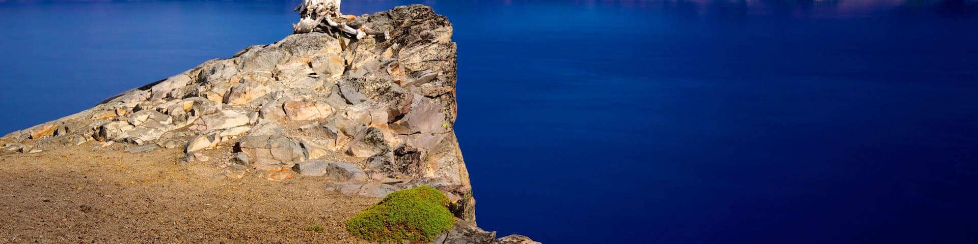 Crater Lake National Park featuring a lake or waterhole, landscape views and mountains