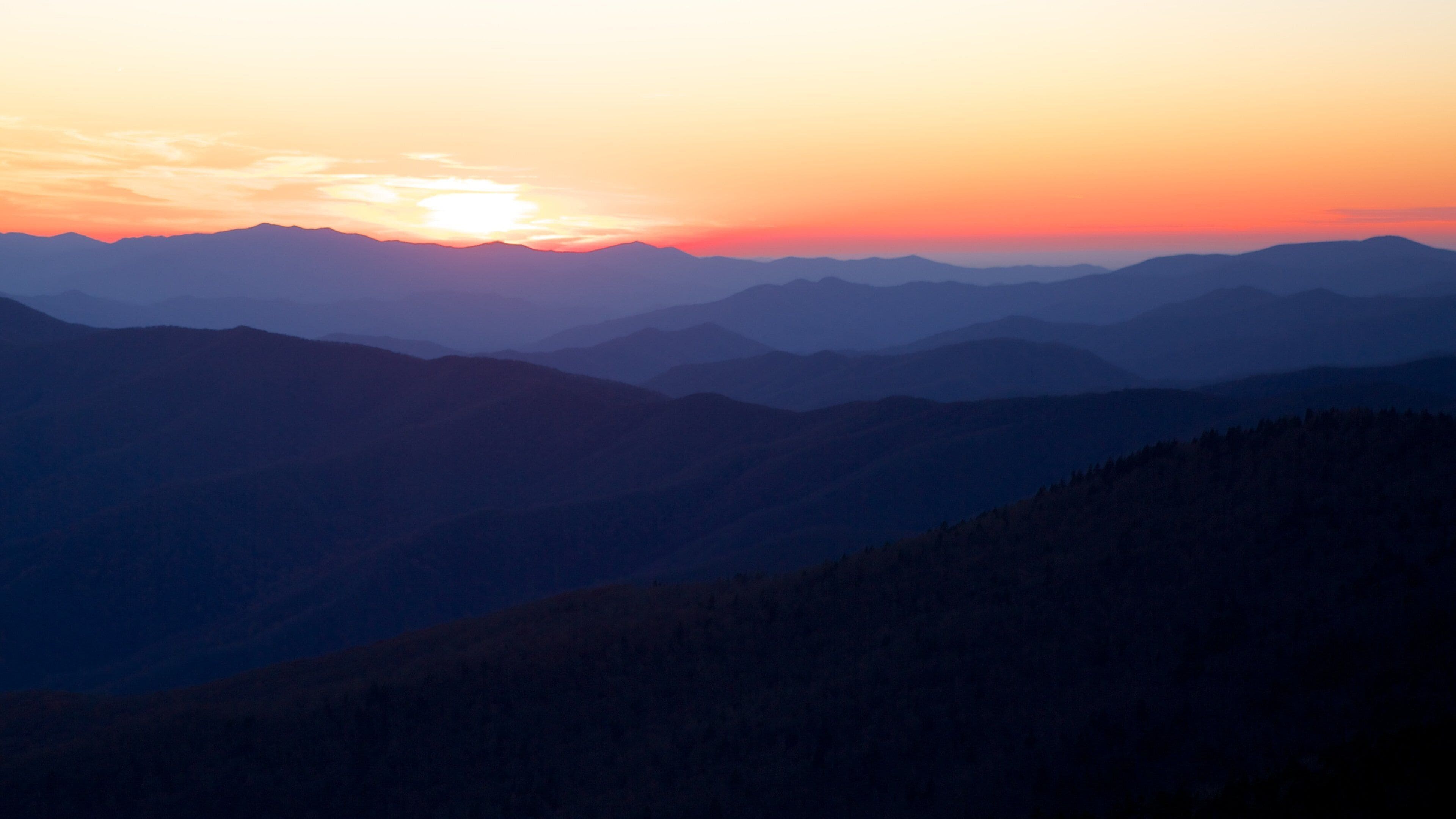 Great Smoky Mountains National Park showing landscape views, mountains and a sunset