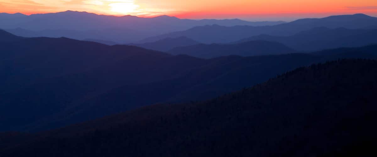 Great Smoky Mountains National Park showing landscape views, mountains and a sunset