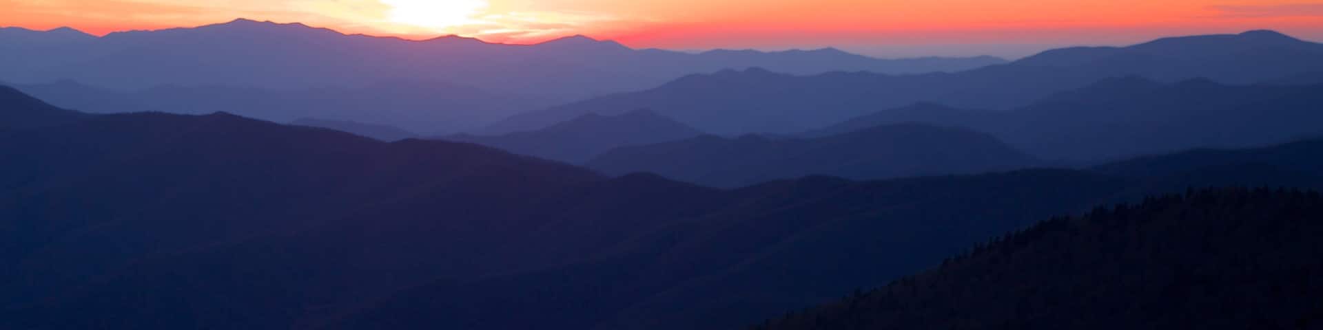 Great Smoky Mountains National Park showing landscape views, mountains and a sunset