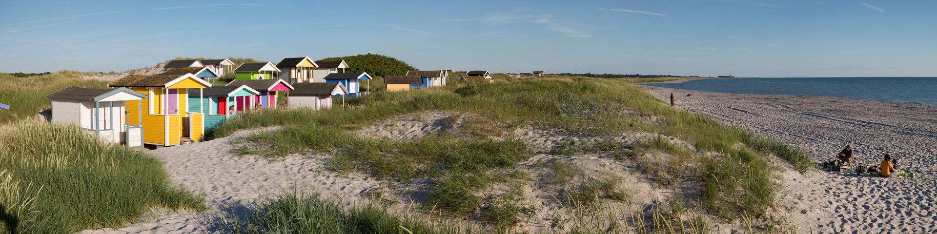 Colourful beach huts in sand dunes, Skanor Falsterbo, Falsterbo Peninsula, Skane, South Sweden, Sweden