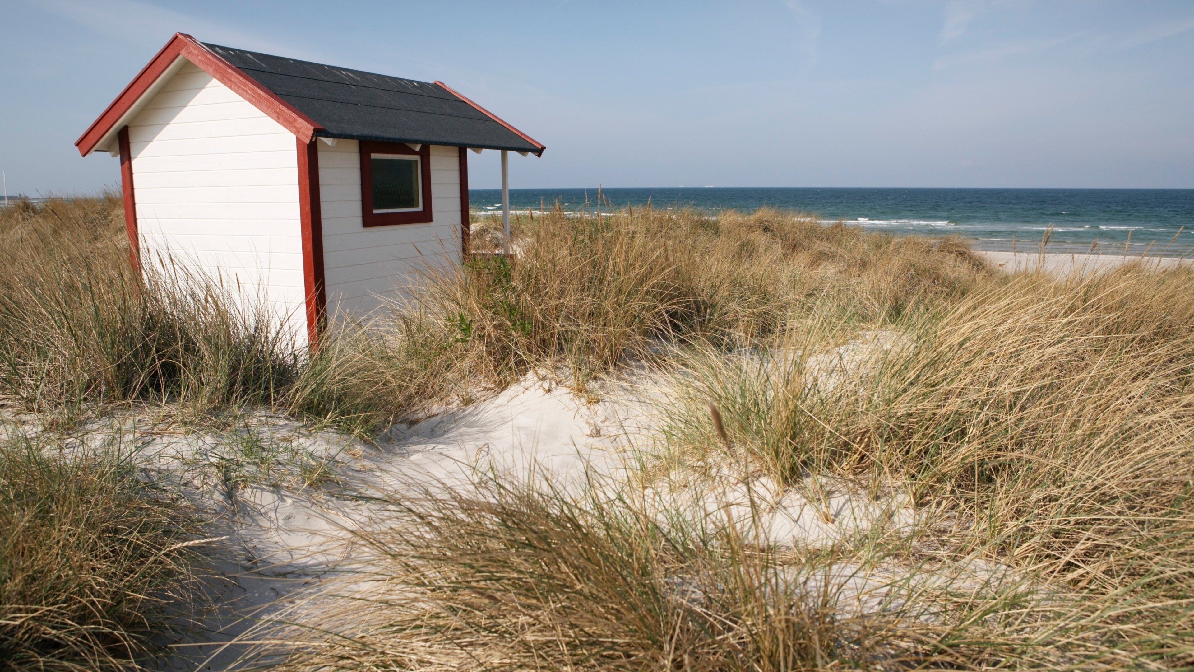 Skanör som inkluderar en sandstrand