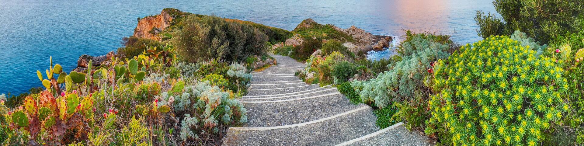 Dramatic spring sunrise on the the cape Milazzo panorama of nature reserve Piscina di Vener