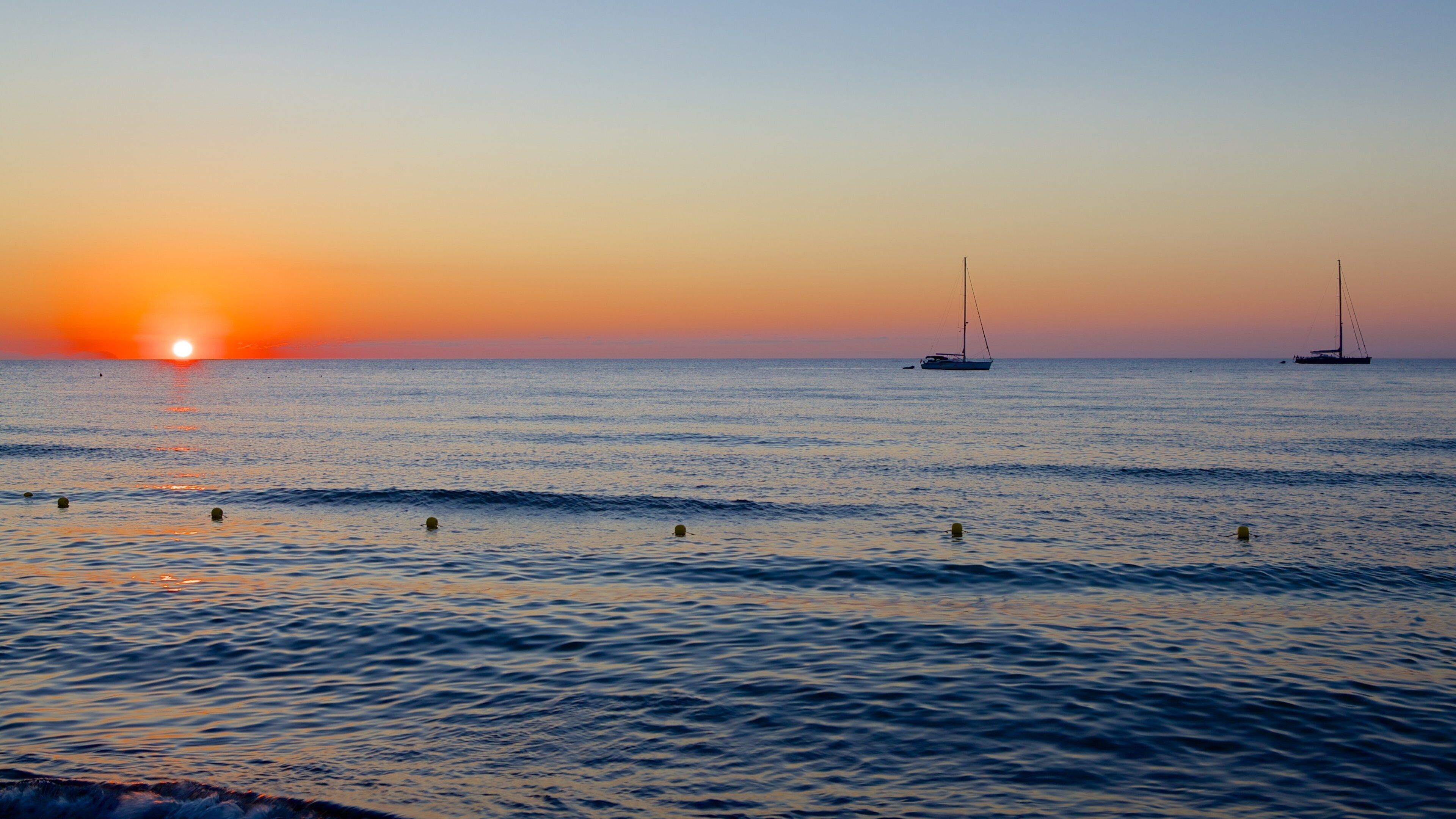 Cefalù showing a sunset and general coastal views