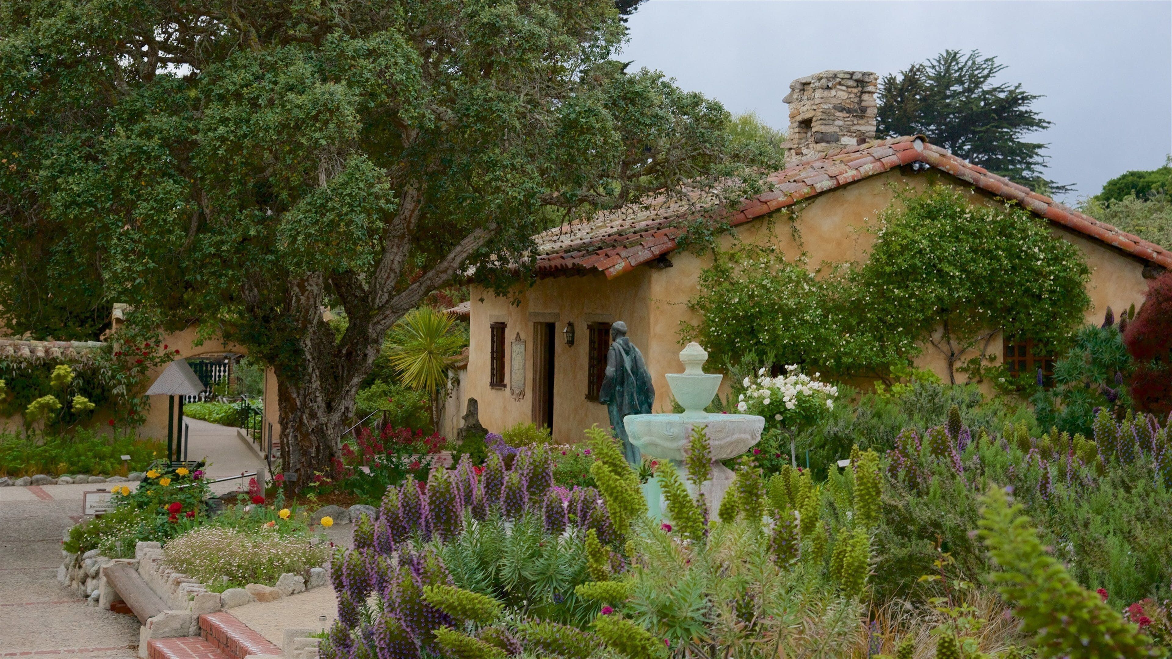 Carmel featuring a house and a garden