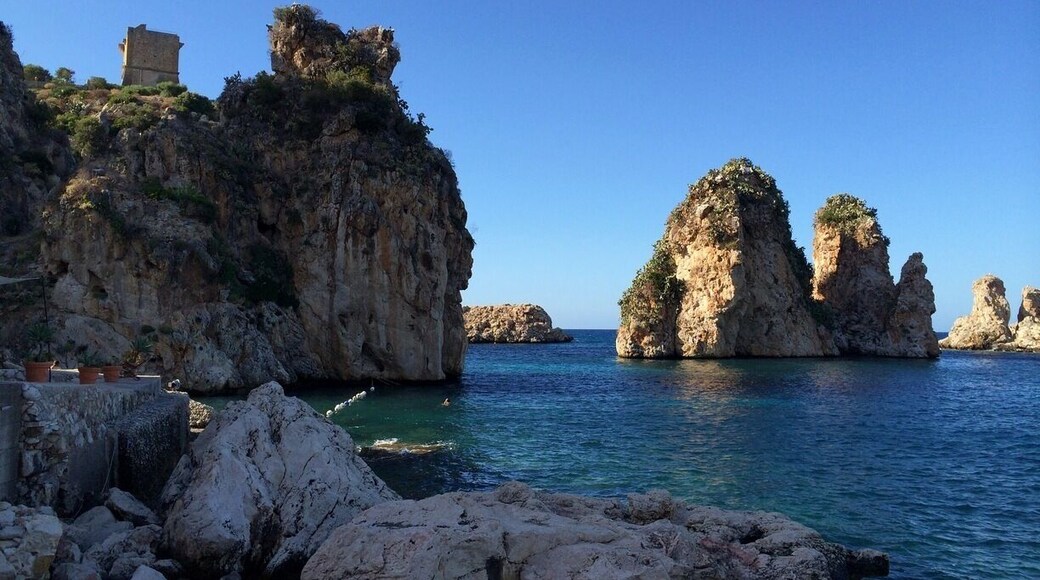 Lo Zingaro Nature rezerve.
West of Palermo, just after Castellammare del Golfo, the coastline becomes rugged, rocky and, in places, spectacular. That most natural of sculptors, the sea, has worked minor miracles, creating a myriad of coves, sea stacks and grottoes in the hard limestone cliffs.