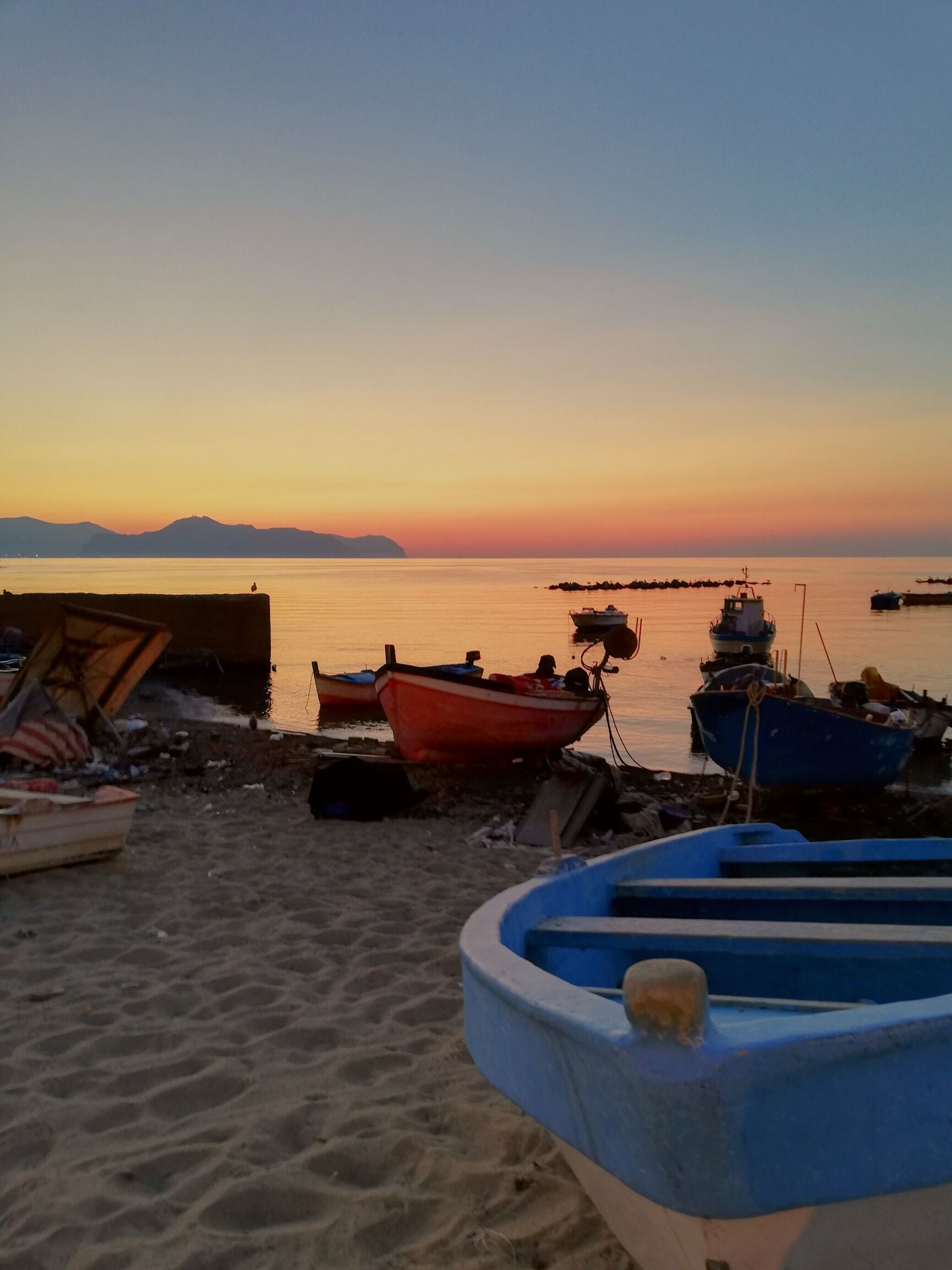 Close to Palermo there is a small fishing village called Aspra.  Promenade by the sea is breathtaking during sunset, when the sky and the sea are coloured with shades of red and pink

#italy #sicily