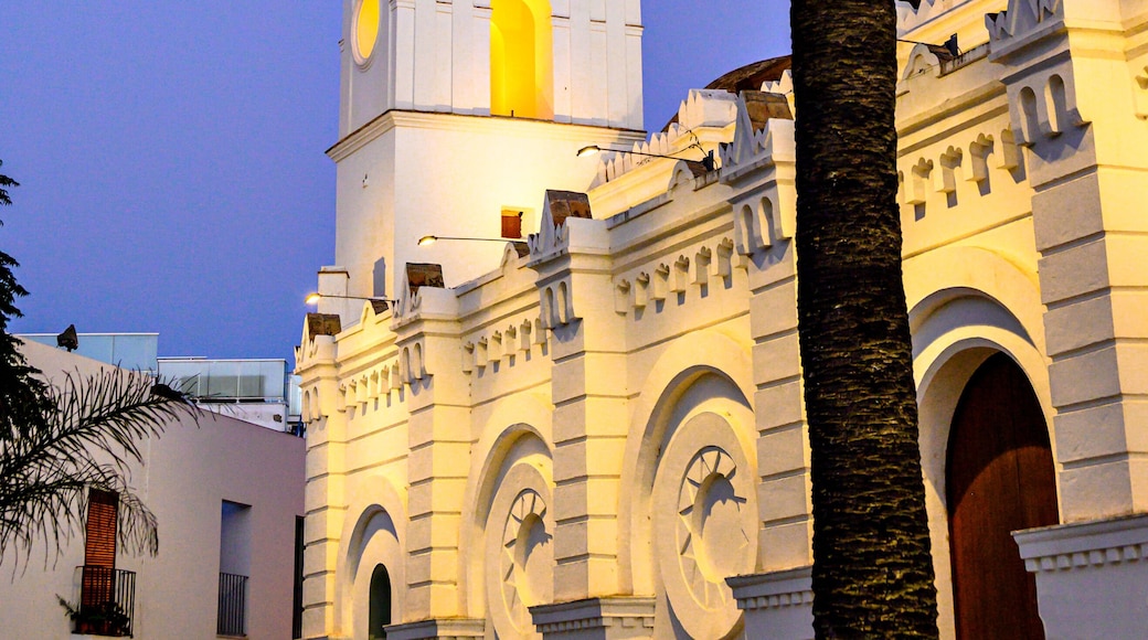 Vertical sunset shot of the Iglesia de Santa Catalina in Conil de la Frontera, Cadiz, Spain.