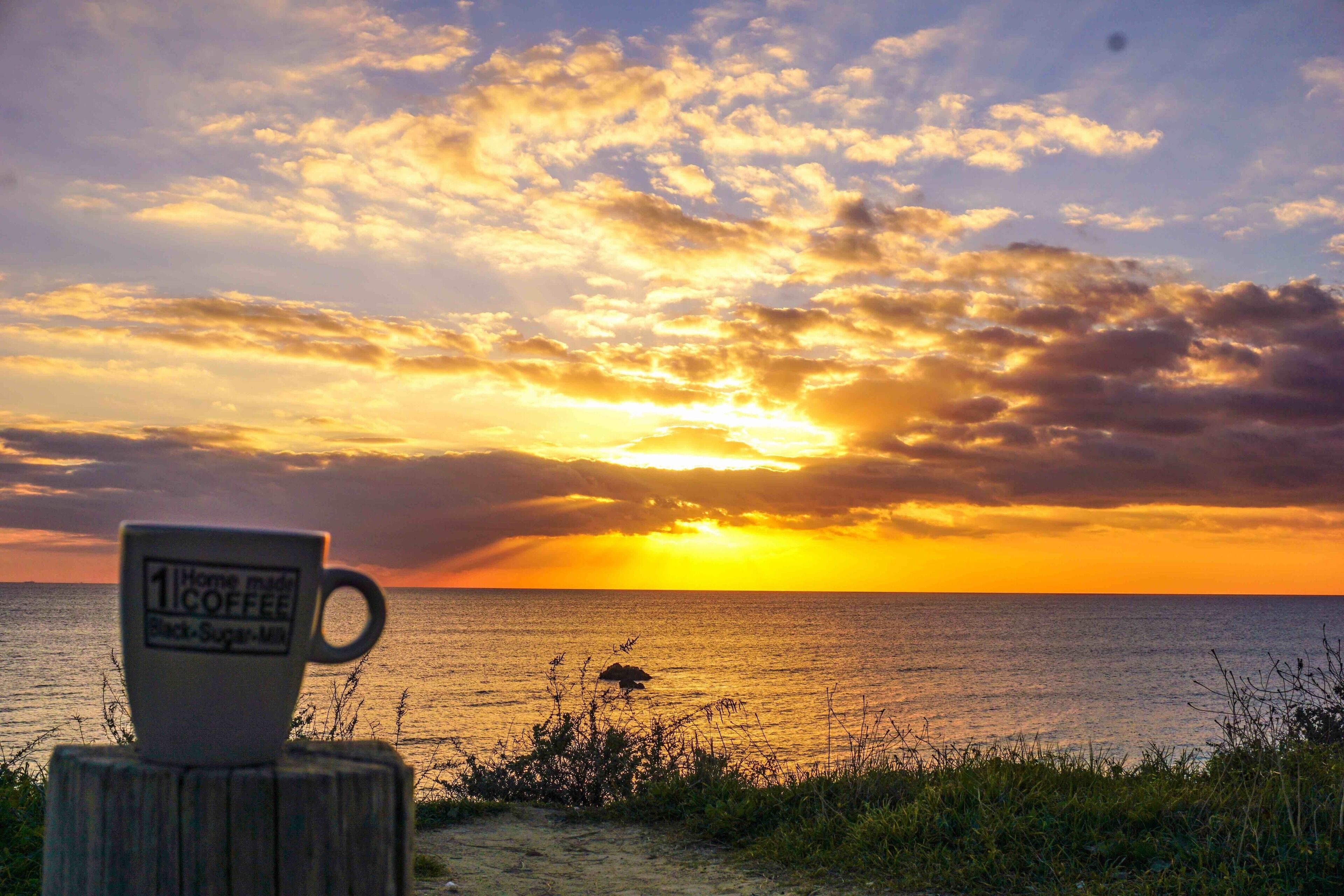 Sunset white a nice cup of coffee