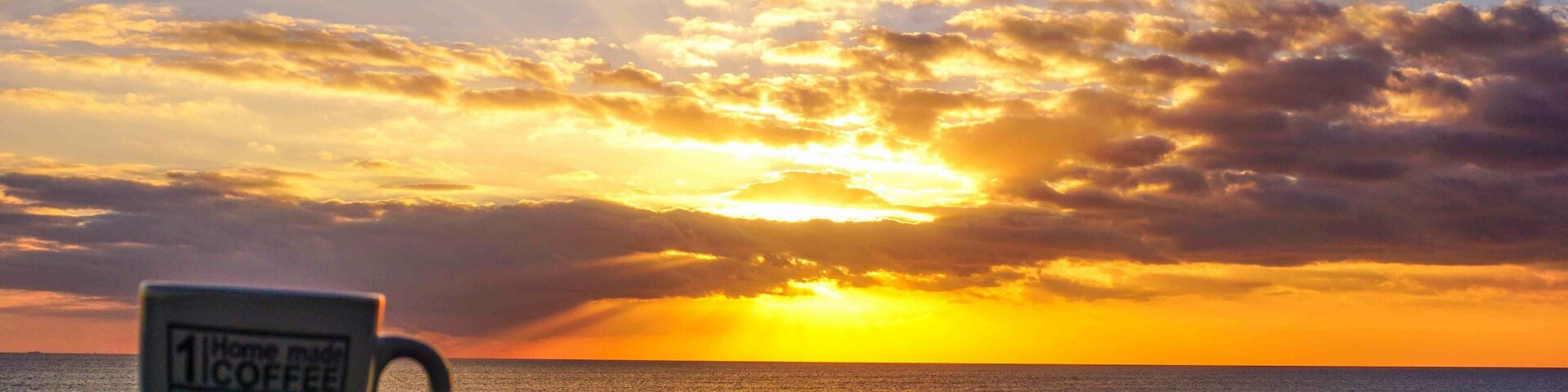 Sunset white a nice cup of coffee