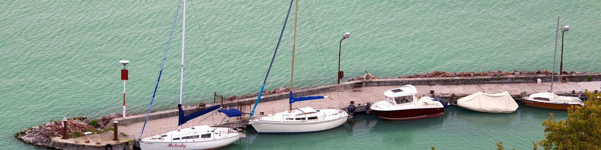 Tihany which includes a lake or waterhole and a marina