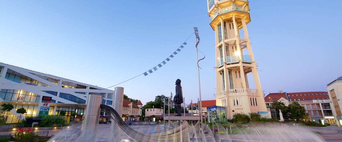 Siofok which includes a fountain, a monument and heritage architecture