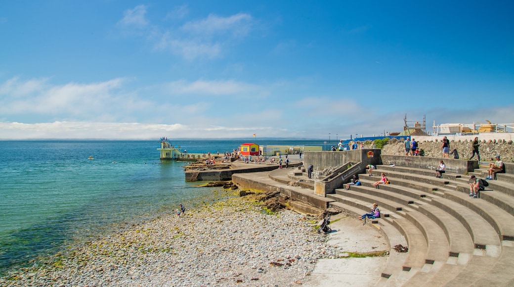 Salthill which includes a pebble beach, swimming and general coastal views