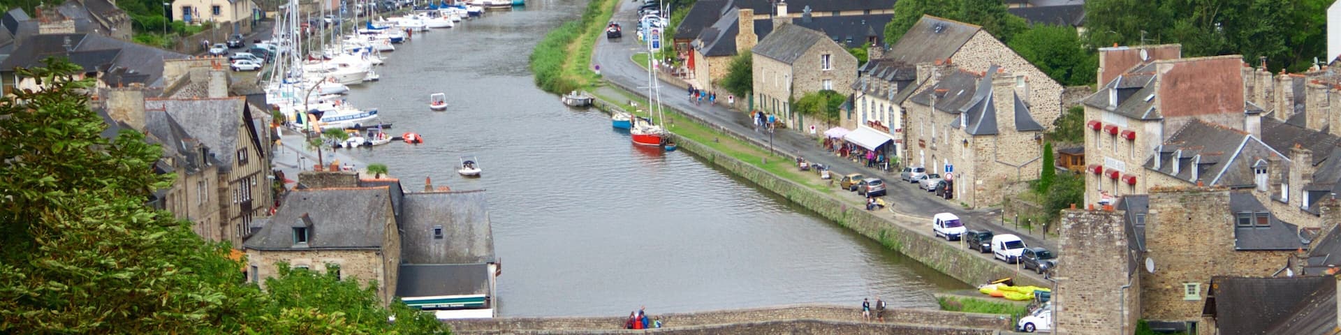 Dinan featuring a river or creek, heritage elements and a bridge