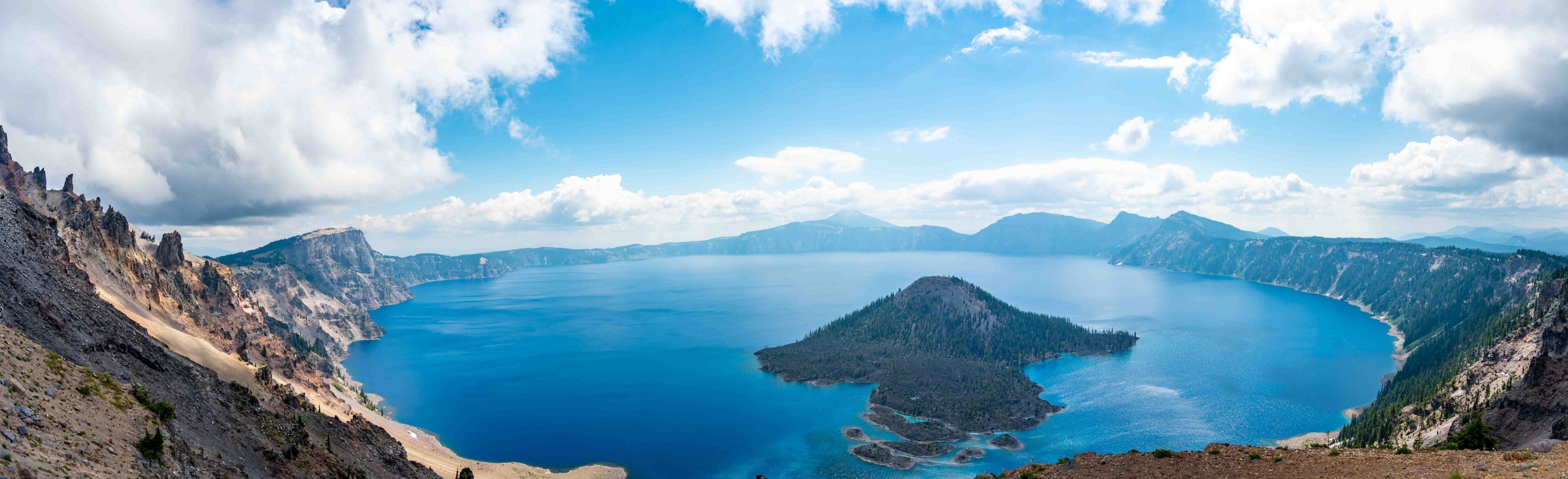 Panoramic view of Crater Lake and Wizard Island in Oregon 