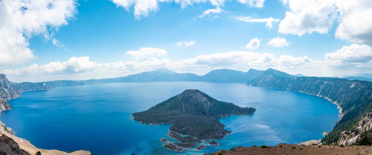 Panoramic view of Crater Lake and Wizard Island in Oregon