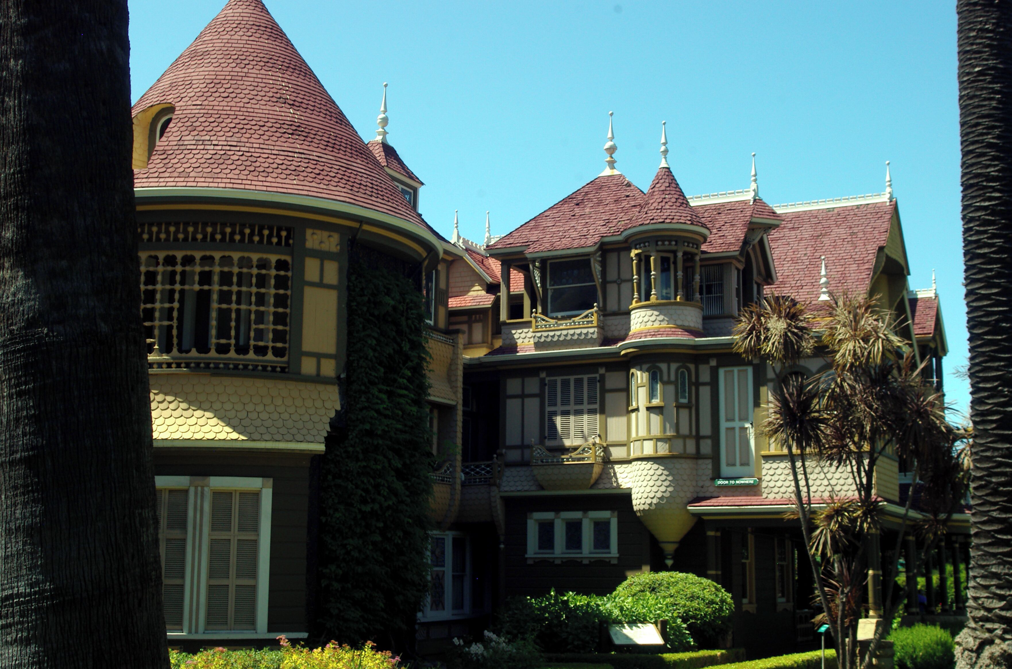 The mansion was once owned by Sarah Winchester, the widow of firearms William Wirt Winchester.  The Queen Ann Style Victorian mansion is renowned for it's size, it's architecual curiosities and it's lack of any master building plan.  Under her day-to-day guidance, it's "from-the-grounds-up" construction  proceeded, by some  accounts, non-stop 24/7 for 38 years until her death in 1922 at which time construction ceased.