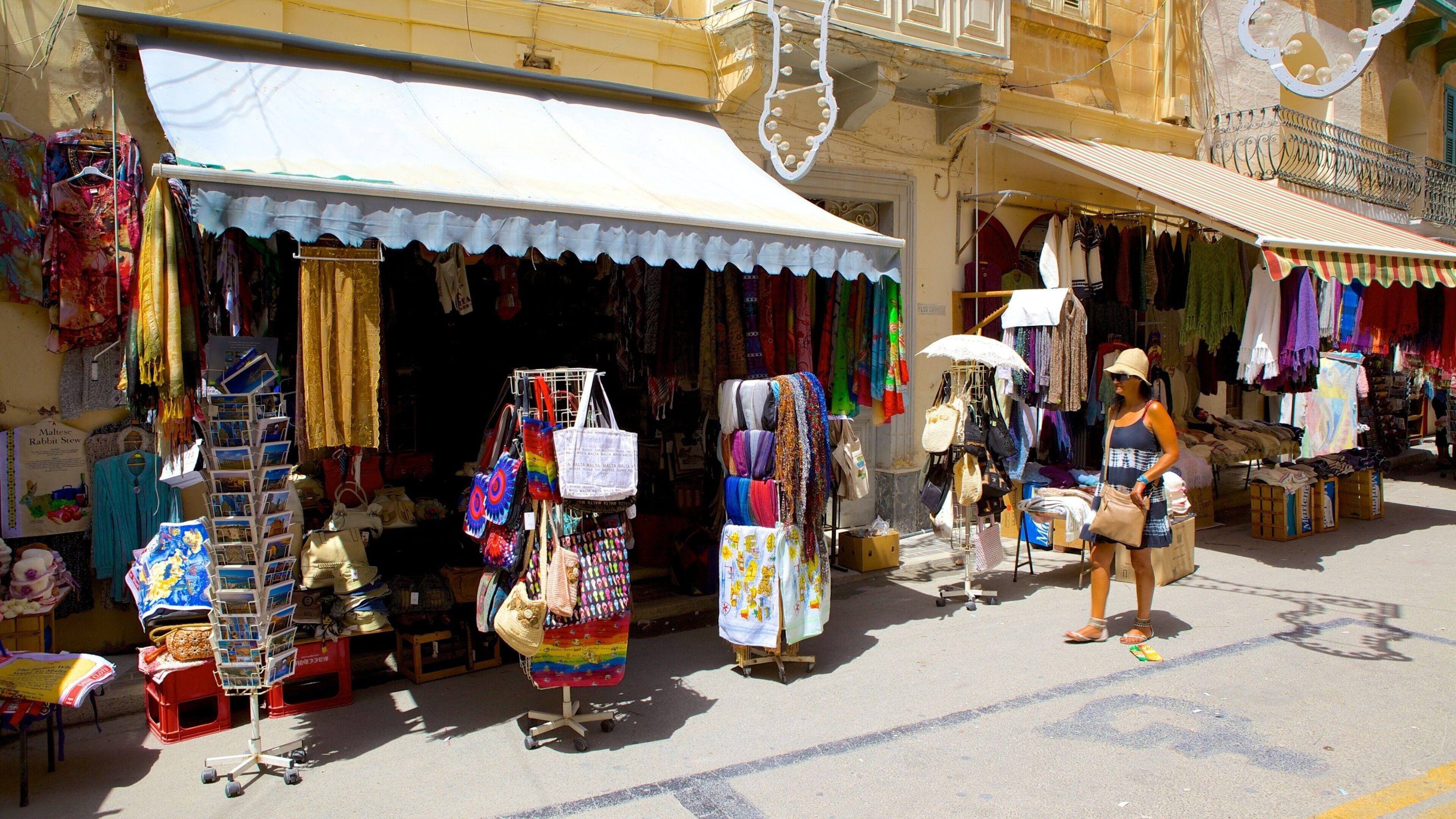 Gozo which includes street scenes as well as an individual femail