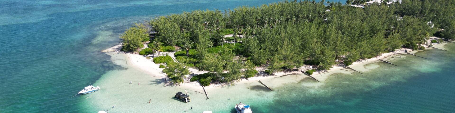 Starfish Point Rumpoint North Side Grand Cayman Aerial in the Cayman Islands Caribbean Sea British West Indies Beautiful pristine water with boats and island view