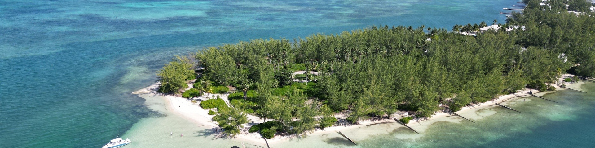 Starfish Point Rumpoint North Side Grand Cayman Aerial in the Cayman Islands Caribbean Sea British West Indies Beautiful pristine water with boats and island view