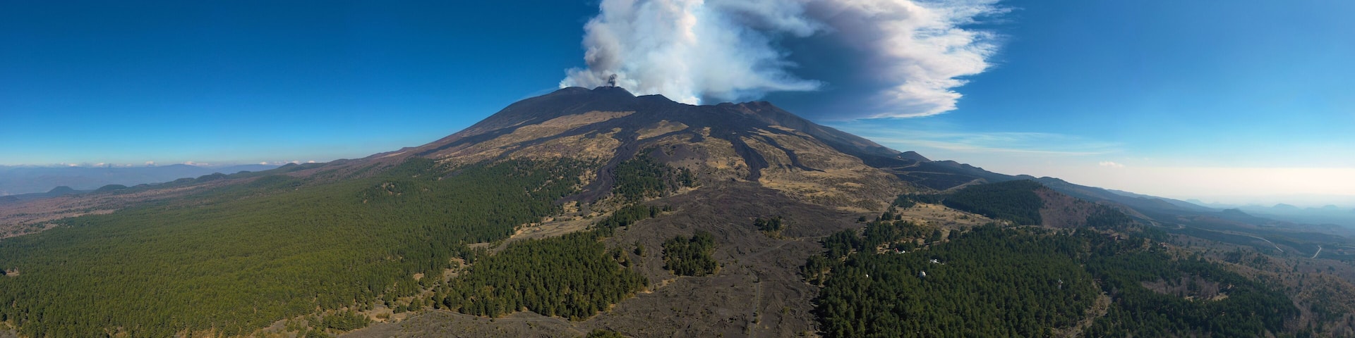 Virtual reality panorama at 180 degrees of the eruption of the Etna volcano on 4 March 2021. Paroxysm on Etna in Sicily. Lava flow inside the Valle del Bove.