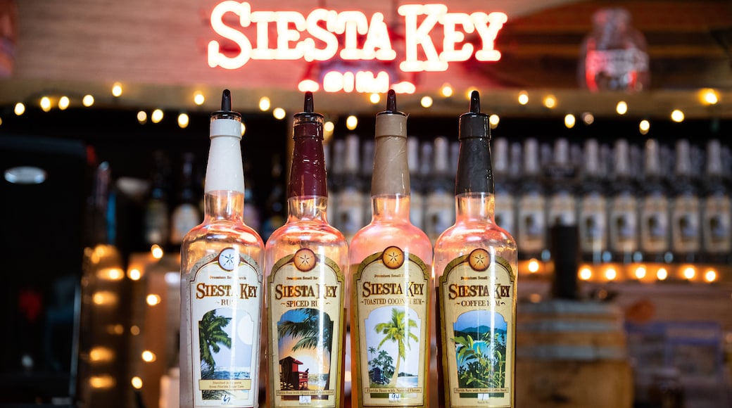 Sarasota which includes a bar, drinks or beverages and interior views