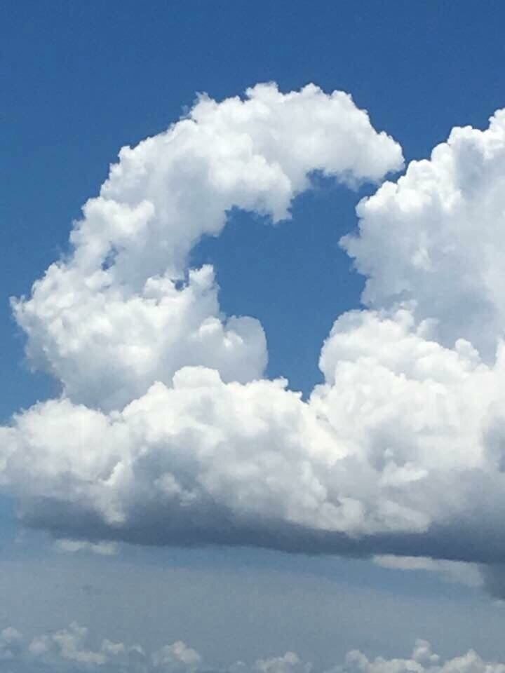 Caught this cloud formation at the perfect time. Was with the love of my life. 