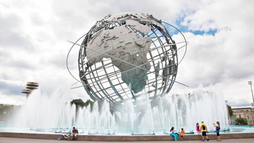 Corona which includes a fountain and a statue or sculpture