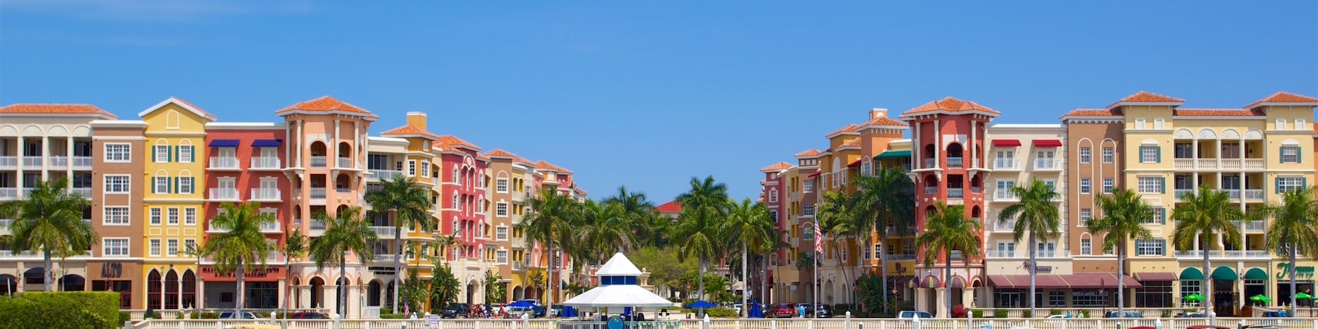 South Florida showing a coastal town, a marina and a bay or harbor