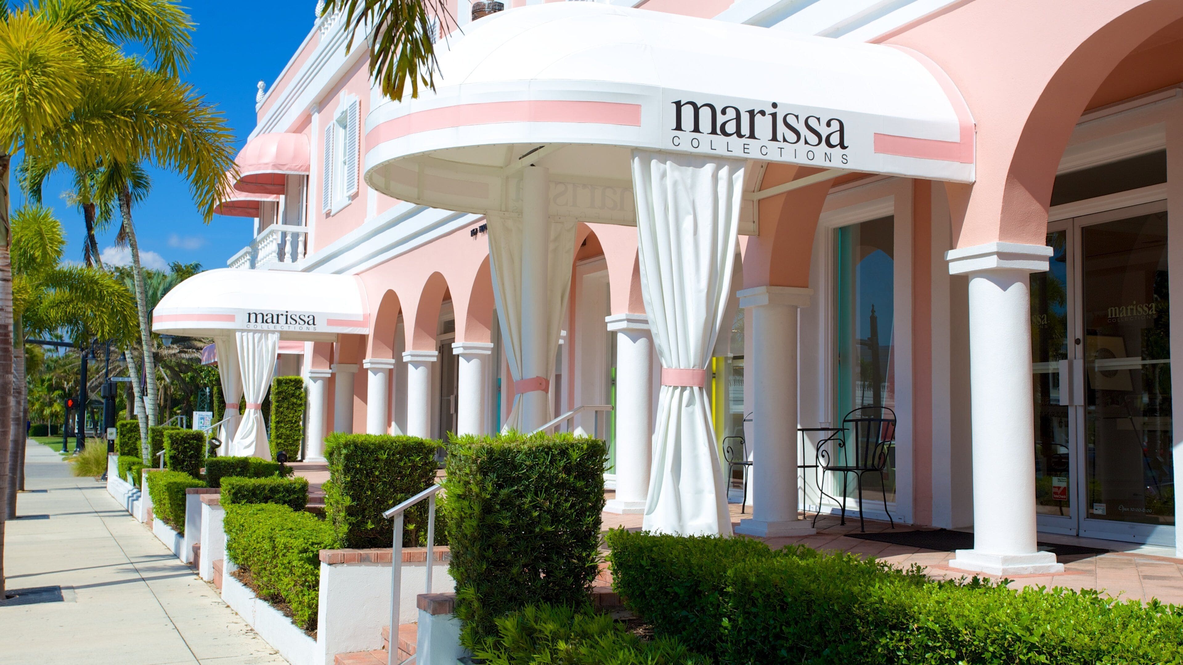 Naples showing shopping and signage