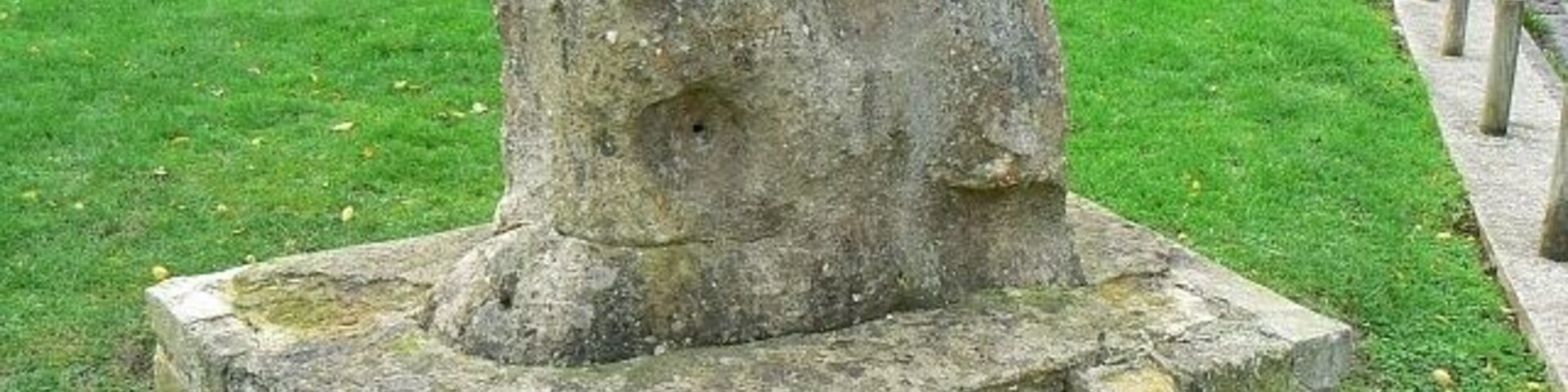 Memorial stone, Station Road, Chiseldon, Swindon The stone is a sarsen stone, I believe, as are the much larger examples at Avebury. There is no plaque to give any information about it although carved into it is what looks like a dagger and the numbers '1075-1975', which presumably are dates. The village was mentioned in the Domesday book of 1086 so possibly 1075 represents the first time any mention was ever made of it. The base is getting a bit tatty and could usefully be repaired.