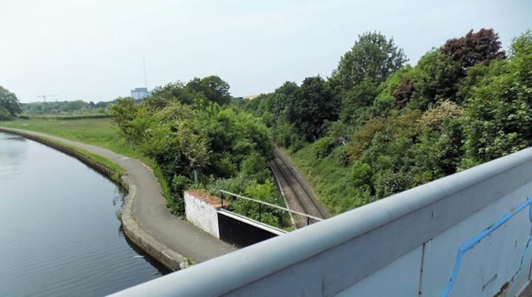 A road bridge over a canal over a rail track
part of the grand union canal