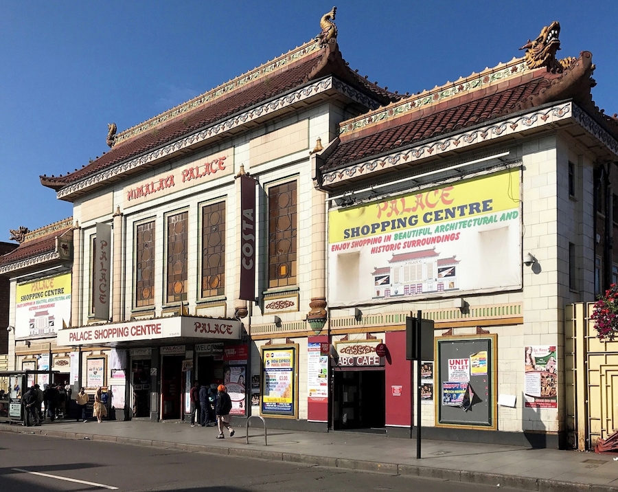 Chinese style cinema with tiled exterior and pagoda roof incorporating dragons. Presently an indoor market.
Date: 1929.
Architect: George Coles.
Grade II* listed.
Nearest station: Southall.