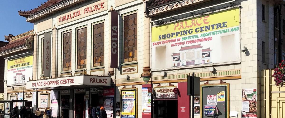 Chinese style cinema with tiled exterior and pagoda roof incorporating dragons. Presently an indoor market.
Date: 1929.
Architect: George Coles.
Grade II* listed.
Nearest station: Southall.