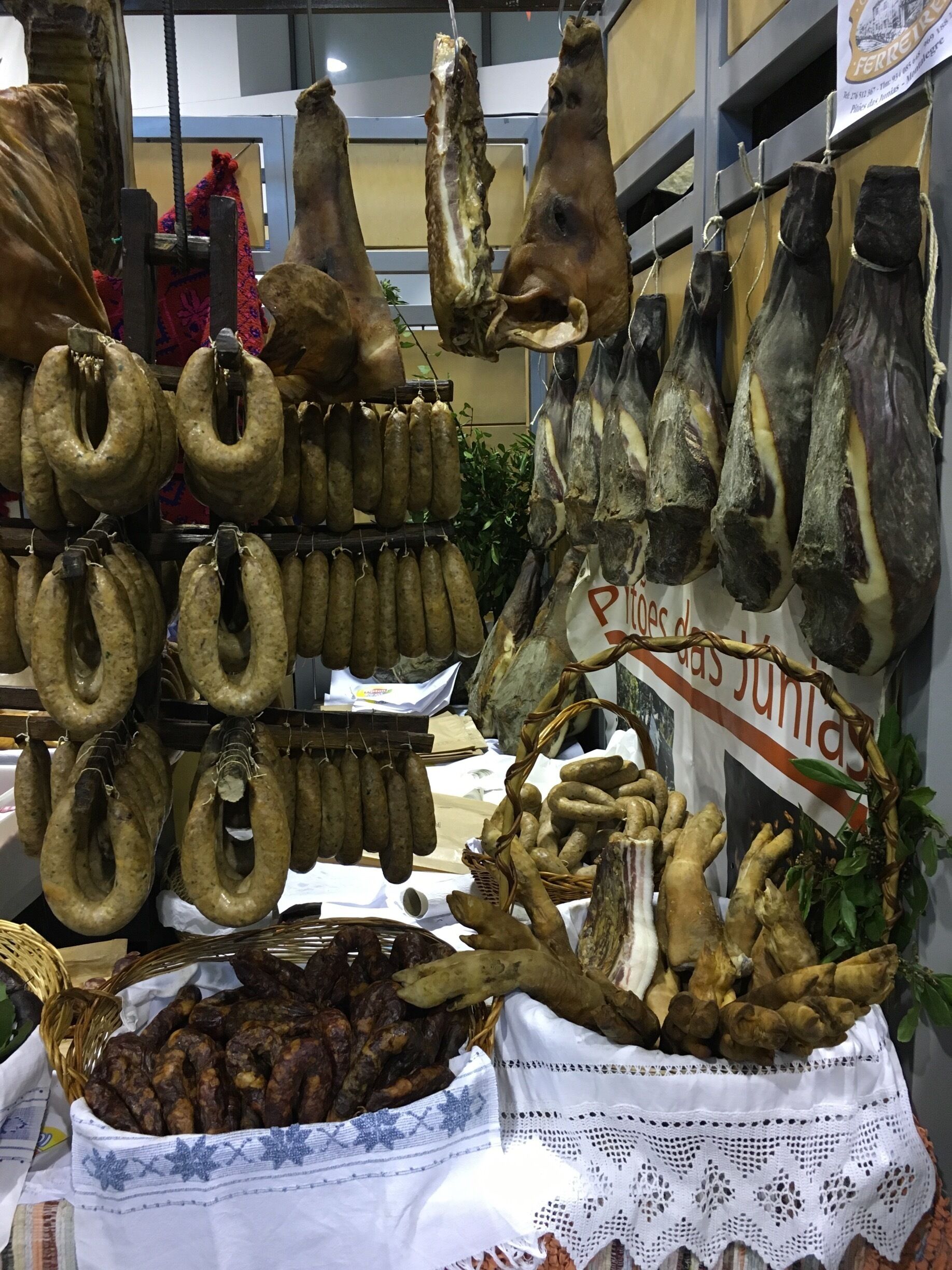 Regional exposition of ham and different....(sorry guys,...don't know how to translate it  to English ☺️)... 
chouriços, alheiras, morcelas, farinheiras!
Well....all those are kind of sausages...but are not  sausages, sausages 😃
Let's say...they are Portuguese style sausages! 😎

Montalegre 

