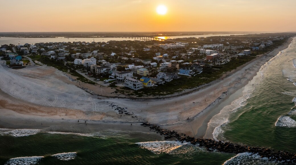 Aerial view of serene sunset over Vilano Beach shoreline, St. Augustine, Florida, United States.