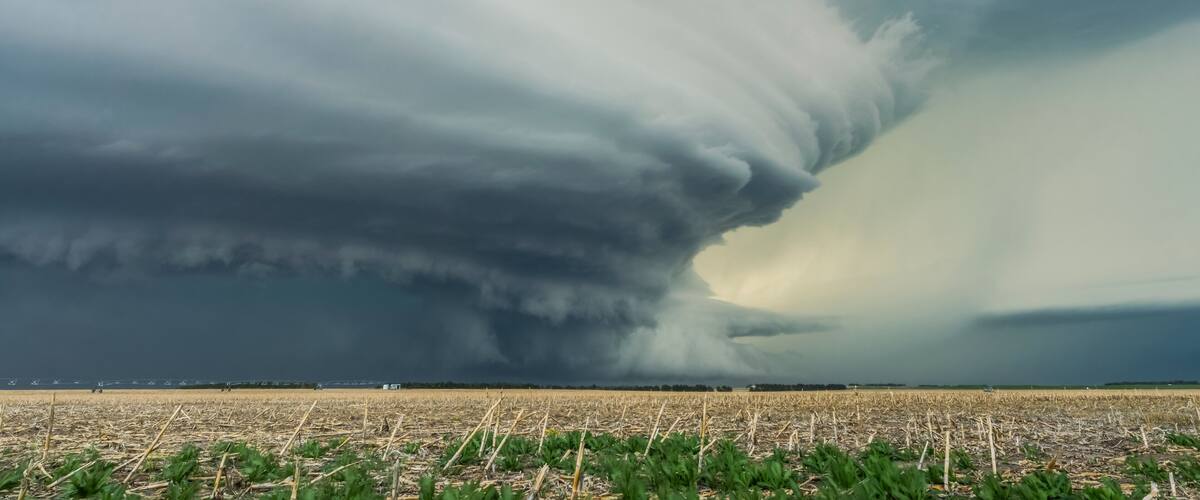 Dramatic dark storm clouds over farmland; Imperial, Nebraska, United States of America