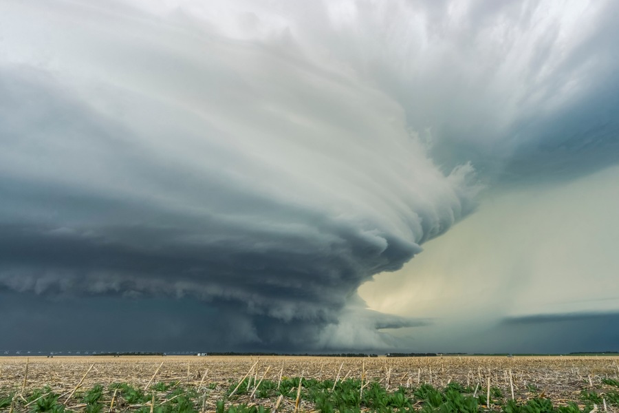 Dramatic dark storm clouds over farmland; Imperial, Nebraska, United States of America