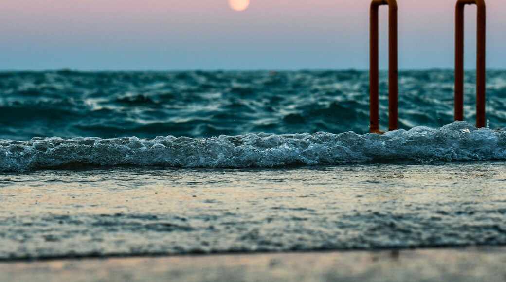 Ocean waves with full moon on Lake Michigan