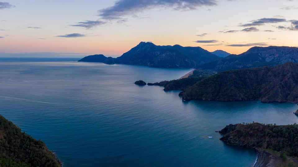 Panoramic aerial view of Mediterranean coastline between Tekirova and Olympos on winter sunset. Turkey.