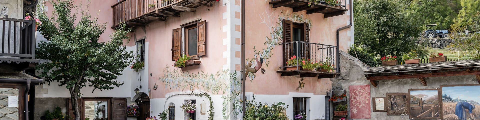 traditional decorated house at Usseaux village, Italy
